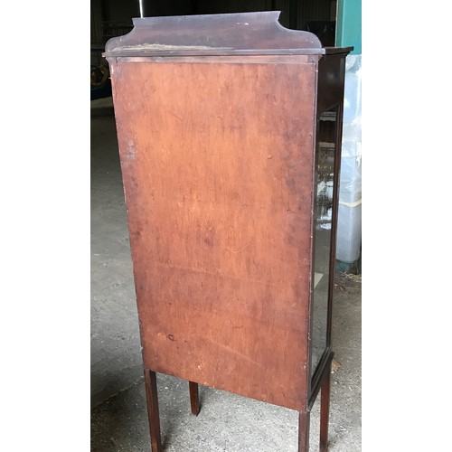 742 - An Edwardian mahogany inlaid display cabinet. Height to back 147cms x 59ms w x 30cms d. With key.