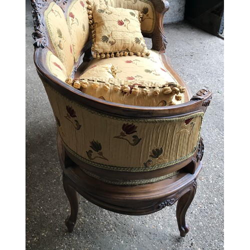 744 - A 19thC carved walnut framed two seater sofa, floral upholstered with matching cushions. Height to s... 