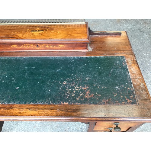 745 - An Edwardian rose wood inlaid desk with green leather top , 6 drawers and square legs. 92cms w x 49c... 