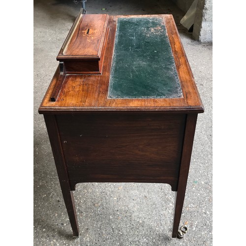 745 - An Edwardian rose wood inlaid desk with green leather top , 6 drawers and square legs. 92cms w x 49c... 