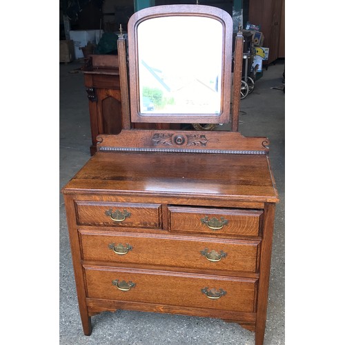 747 - An oak 2 over 2 dressing table with brass handles and square legs. 84cms w x 46cms d x 70cms height ... 