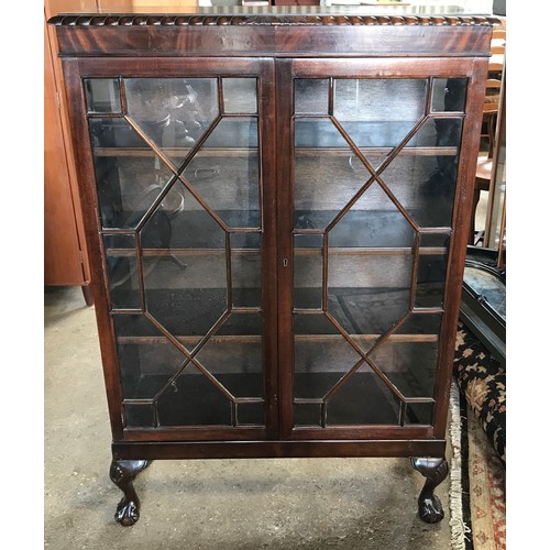 750 - A mahogany 2 door display cabinet with astragal glazed doors , cabriole legs and claw ball feet. 84c... 