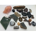 A selection of semi precious stones to include jade, rose, quartz, jet etc.