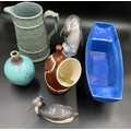 A selection of ceramics to include a blue Holkham pottery boat 42 x 15cms, an Aviemore Pottery salt ... 