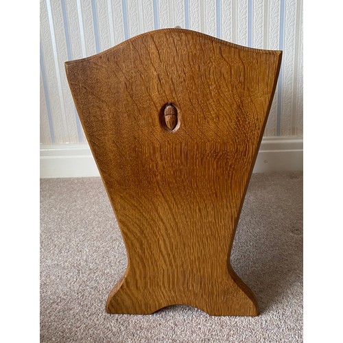 736 - Alan 'Acornman' Grainger of Brandsby, oak magazine rack with slatted tapering sides bearing a fixed ... 