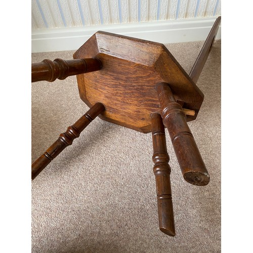 737 - An oak spinning chair. 89cms h x 31cms w.