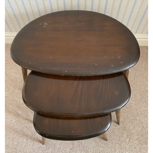 740 - A nest of 3 Ercol tables. Largest 65cms x 44cms x 39.5cms h.