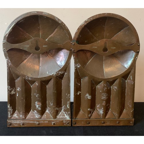 564 - A pair of Arts and Crafts copper wall sconces marked R.W. Ltd. 28cms h.