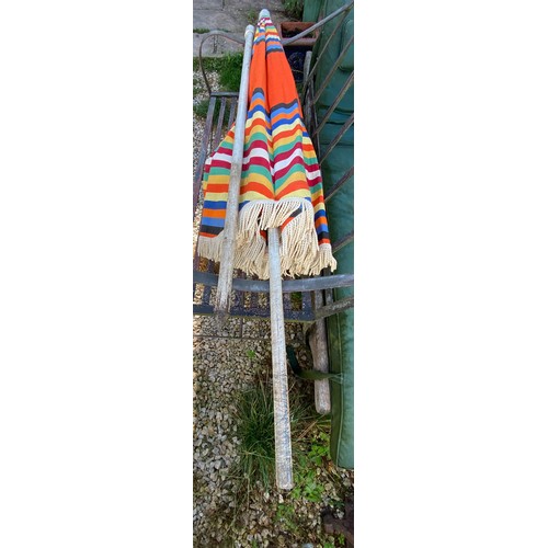 818 - A French Vintage beach parasol marked Veritable O.N.M. Paris. Radius 96cms. Pole 3.1cms approx.