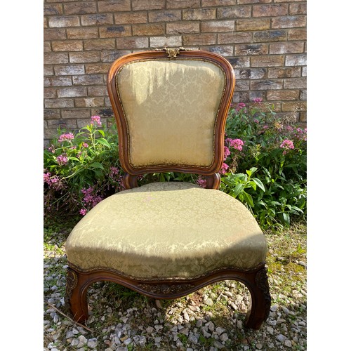 727 - French walnut nursing chair with brass mounts and reduced legs. To seat 25cms h, to back 73cms h, se... 