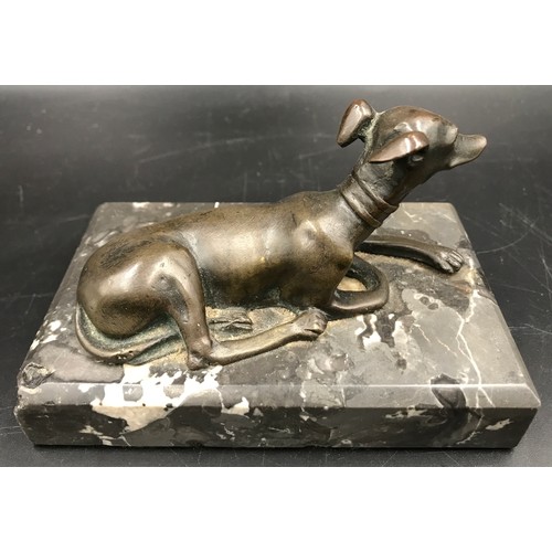 565 - A bronze figure on marble base with whippet/greyhound ? 7.5cms h x 13cms x 8.5cms at base.