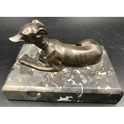 565 - A bronze figure on marble base with whippet/greyhound ? 7.5cms h x 13cms x 8.5cms at base.