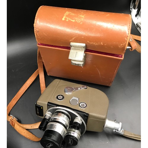 635 - A portable signalling lantern Admiral Pattern 5110.D, Arco 8 Cine Camera with leather case, a Losol ... 