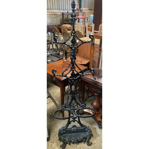 651 - A 19thC cast iron stick stand. 156 h x 50cms w,