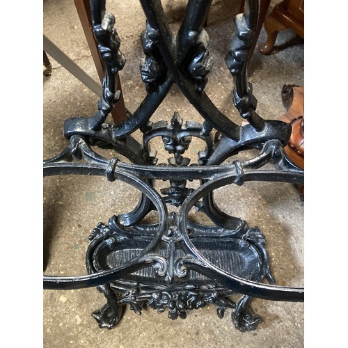 651 - A 19thC cast iron stick stand. 156 h x 50cms w,