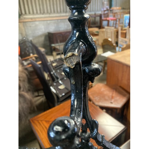 651 - A 19thC cast iron stick stand. 156 h x 50cms w,