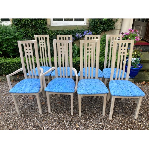 776 - A set of 8 high backed dining chairs including 2 carvers, 110cms height to back.