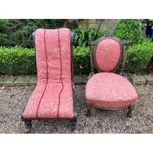 780 - Two Victorian ebonised and gilt upholstered nursing chairs both with turn front legs ans castors.