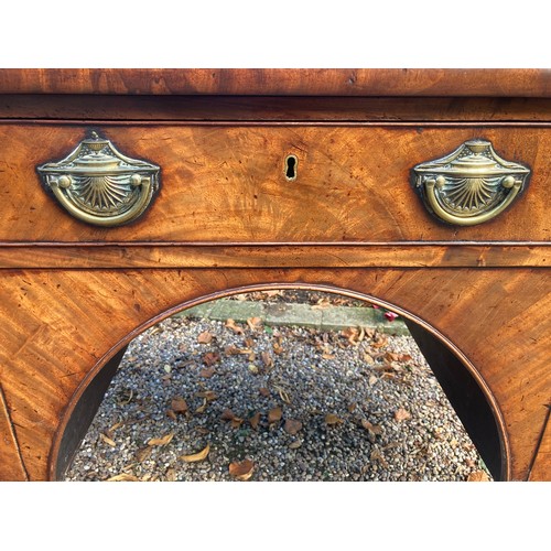 783 - A Georgian mahogany breakfront sideboard with lined drinks drawer. 155 w x 94 h x 66cms d.