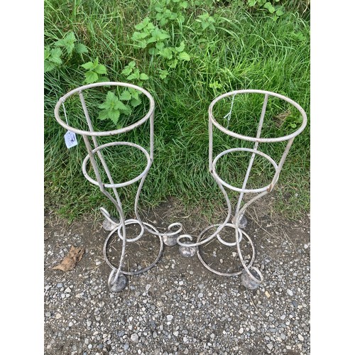 823 - Two vintage metal plant stands. 20 d x 54cms h.