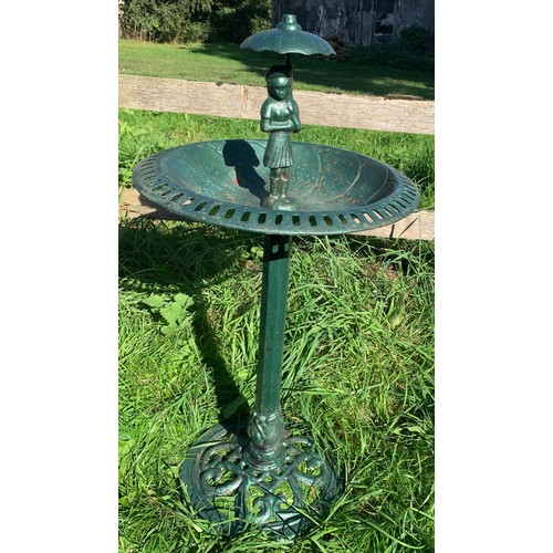 824 - A vintage green cast iron bird bath with figure to top. 47 d x 95cms h.