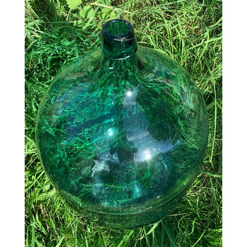 91 - Victorian green glass terrarium. 30 d x 54cms h.