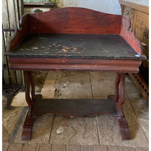 795 - A 19thC stained pine washstand with galleried back. 88 w x 53 d x 96cms h.