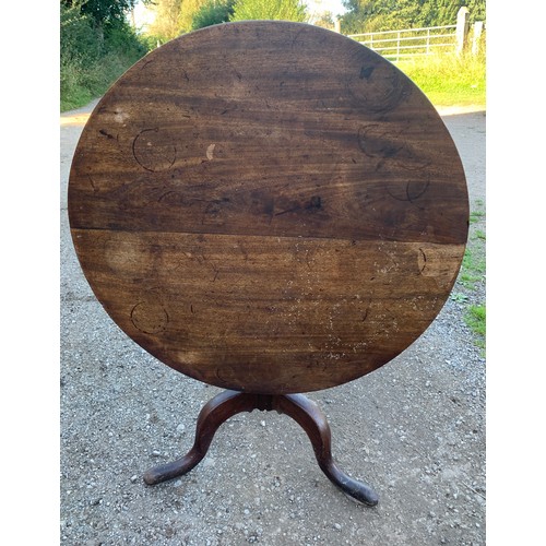 797 - A 19thC mahogany tip top table on tripod base. 98 d x 73cms.