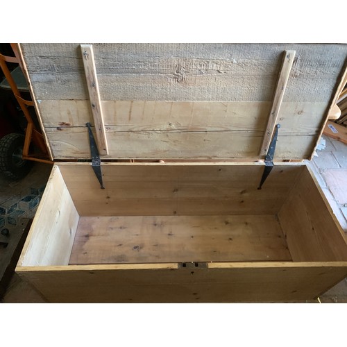 785 - Pine blanket box. 111 w x 47 d x 43cms h with metal handles to side.