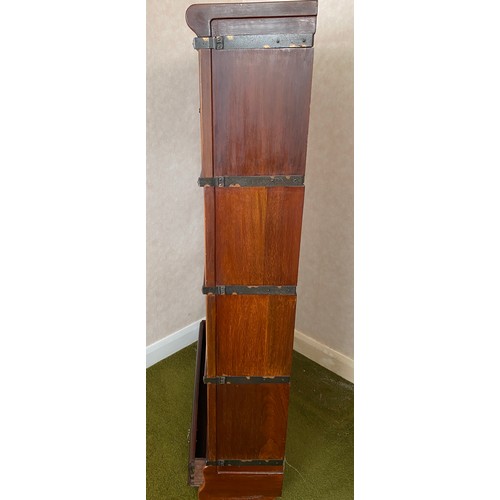 788 - A mahogany Globe Wernicke style bookcase. 86 w x 147 h x 24cms d.