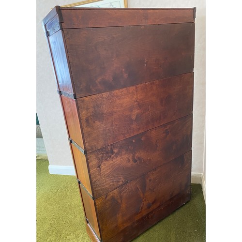 788 - A mahogany Globe Wernicke style bookcase. 86 w x 147 h x 24cms d.