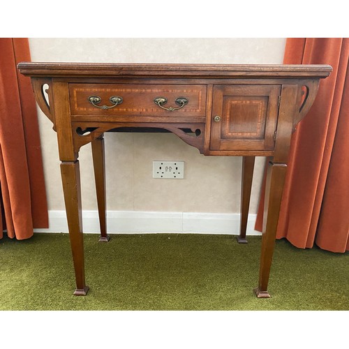 789 - Edwardian mahogany desk/card table. 83 w x 45 d x 776cms h. Baize lining on square tapered legs.