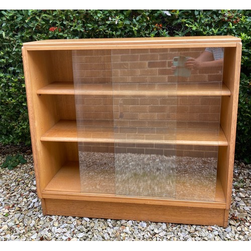 802 - Glazed front bookcase with 2 interior shelves. 23 d/33d at widest. 84cms h.