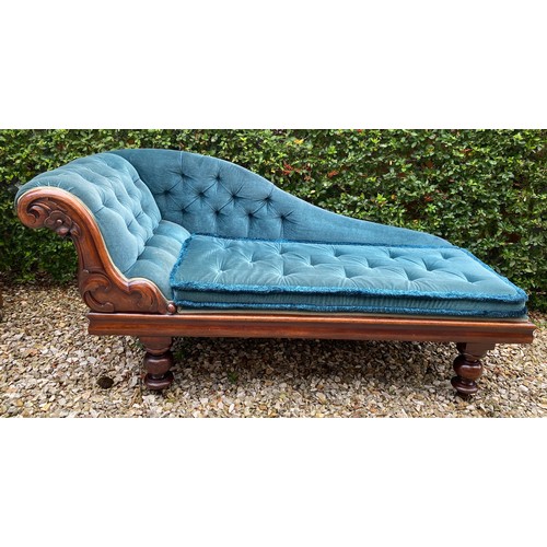 803 - A 19thC mahogany chaise longue on turned feet. 187 l x 67cms d.