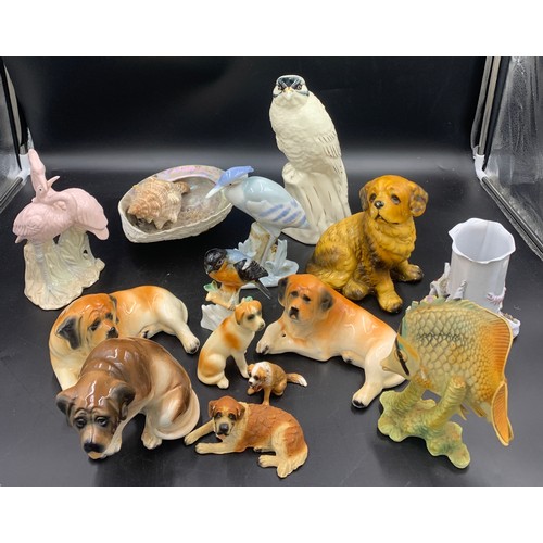 86 - Ceramics to include dogs, Goebel fish, birds, vase and shells etc.