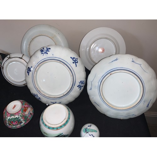 59a - A collection of 19th/20thC Oriental ceramics to include 2 ginger jars, 2 Imari plates 21cms d, rice ... 