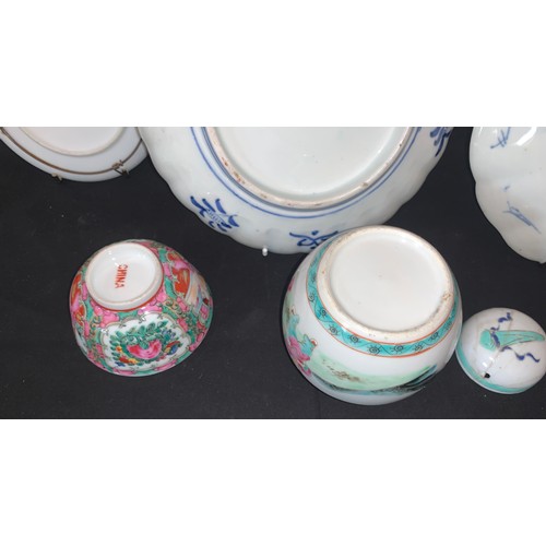 59a - A collection of 19th/20thC Oriental ceramics to include 2 ginger jars, 2 Imari plates 21cms d, rice ... 