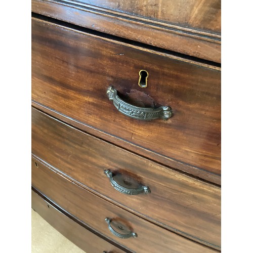 764a - A 19thC mahogany bowfront chest of 2 short over 3 long drawers on turned legs. 114cms w x 54cms d x ... 