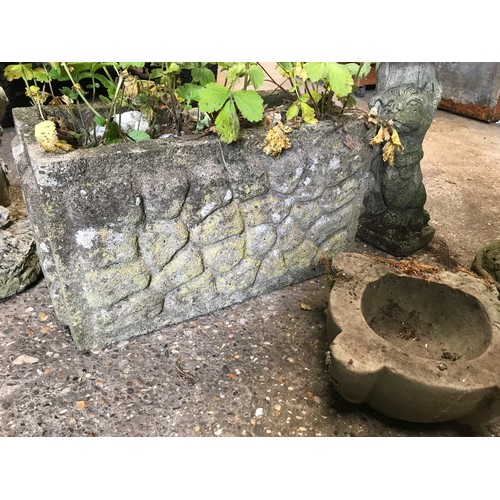 827 - Five concrete garden ornaments to include 2 bird baths one 58cms h and 40cms h, a boy with planter 5... 