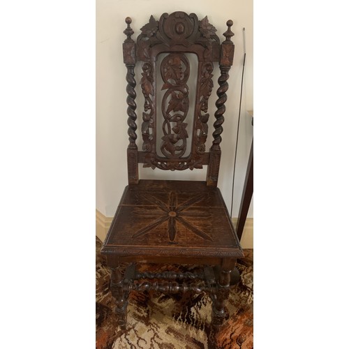 784A - Two 19thC carved oak chairs.