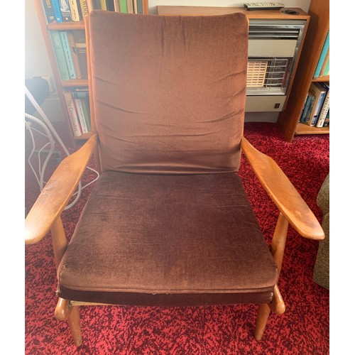 811B - A mid century chair marked Scandart Ltd upholstered armchair.