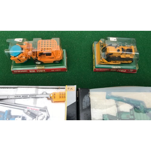 49 - Lot containing 8 Shinsei diecast model vehicles including Kato Hydraulic Excavator, Dozer Shovel, Hi... 