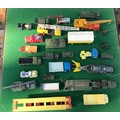 A collection of Dinky Diecast vehicles to include 965 Rear Dump Truck, 674 Austin Champ, 641 Army 1 ... 