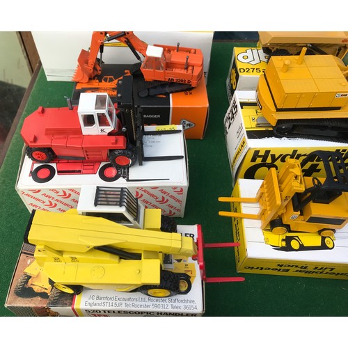 89 - A large collection of diecast toys of mostly NZG Models to include 160 Cat 245 Excavator, 223 Cat 95... 