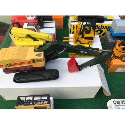 89 - A large collection of diecast toys of mostly NZG Models to include 160 Cat 245 Excavator, 223 Cat 95... 