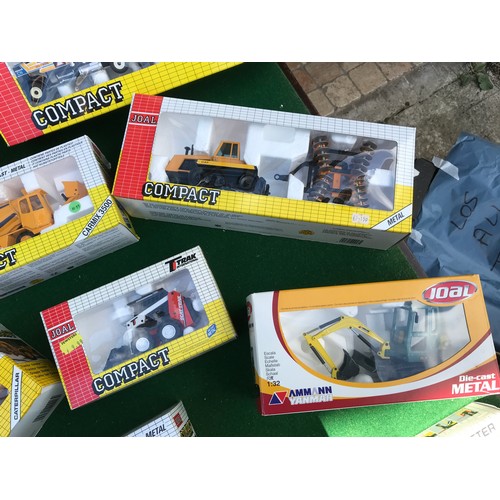 91 - A collection of boxed Joal diecast metal vehicles including 227 Volvo BM, 162 JCB 801, 235 Volvo BM,... 