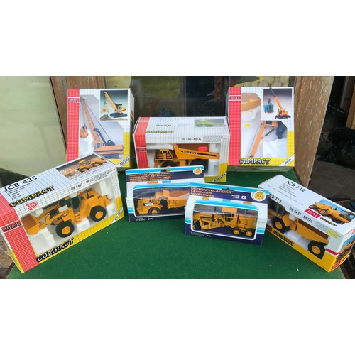 95 - A collection of boxed Joal diecast metal vehicles including JCB 712, 217 Leveller, 222 Tractor Cat, ... 