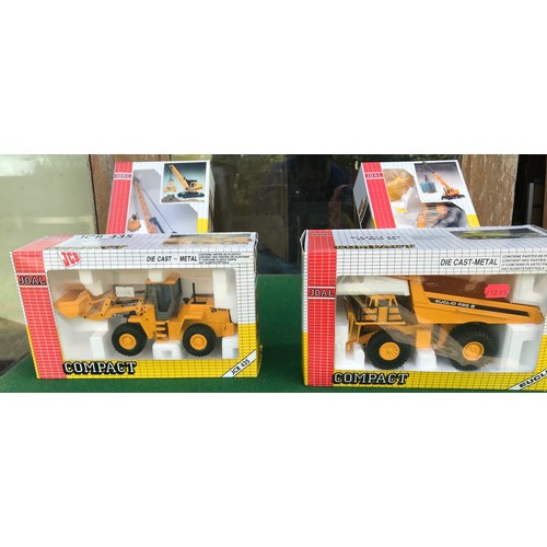 95 - A collection of boxed Joal diecast metal vehicles including JCB 712, 217 Leveller, 222 Tractor Cat, ... 