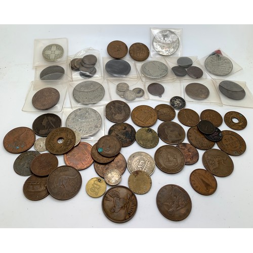 615 - A quantity of old British and foreign coins to include Crowns, pennies etc.