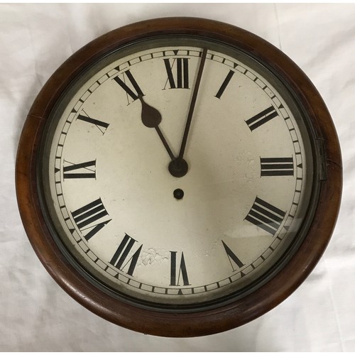 665 - A Railway clock with Fusee movement and Roman numerals in a mahogany case with glass front 38cms d.